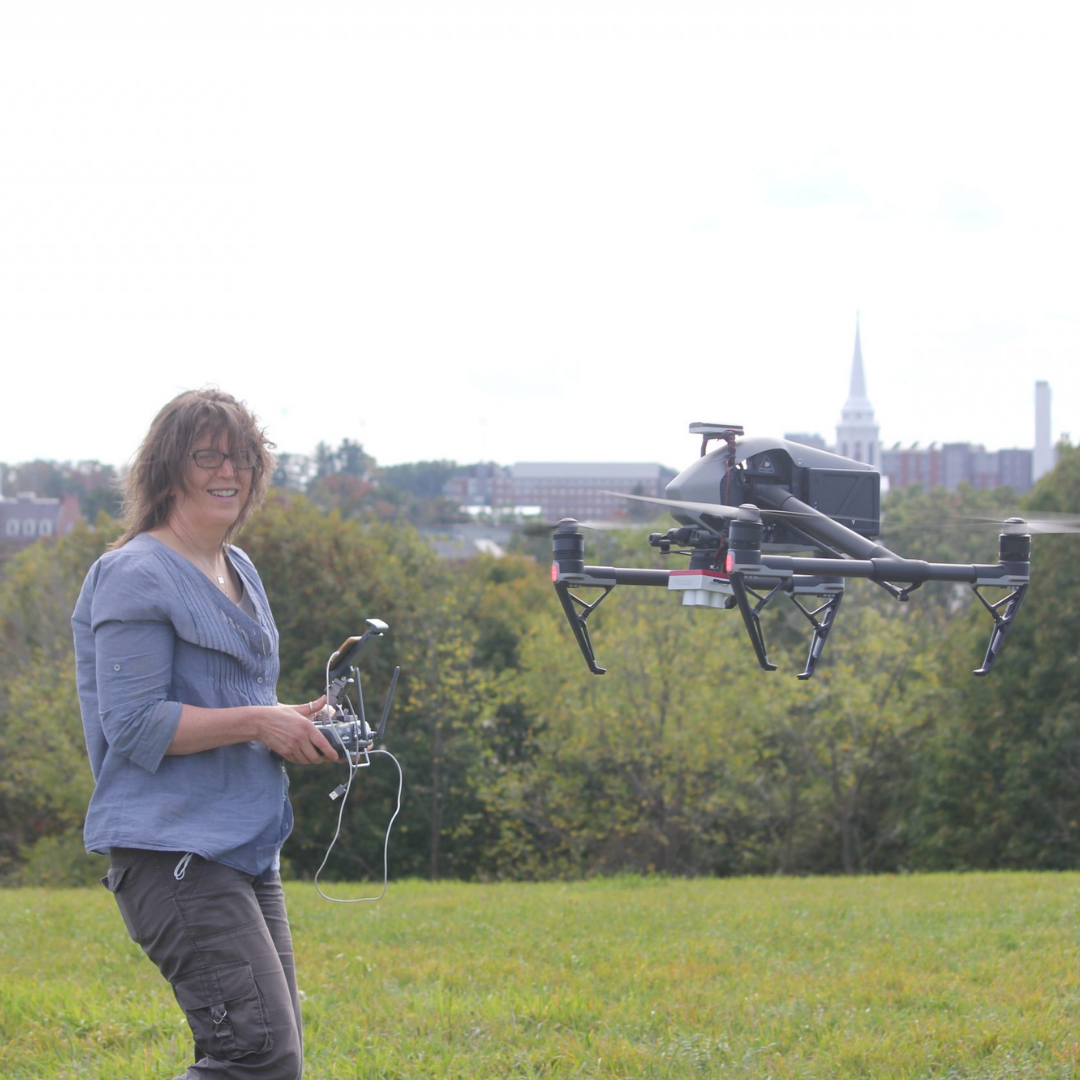 NRE grad piloting a drone